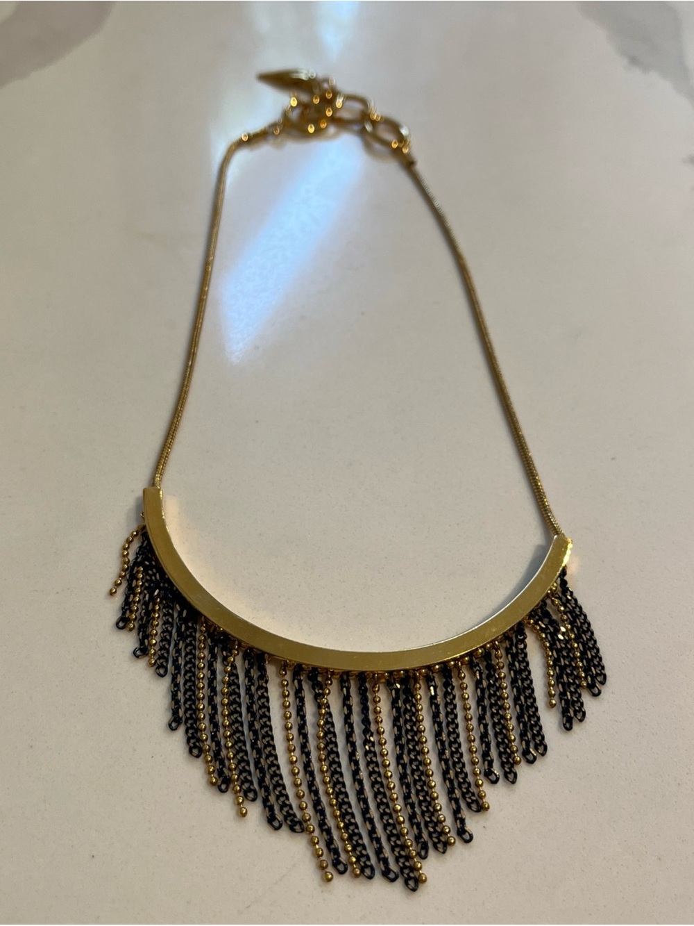 Vintage” DVF” Diane Von Furstenberg Gold-Tone Blue Fringe Necklace. Lips Charm